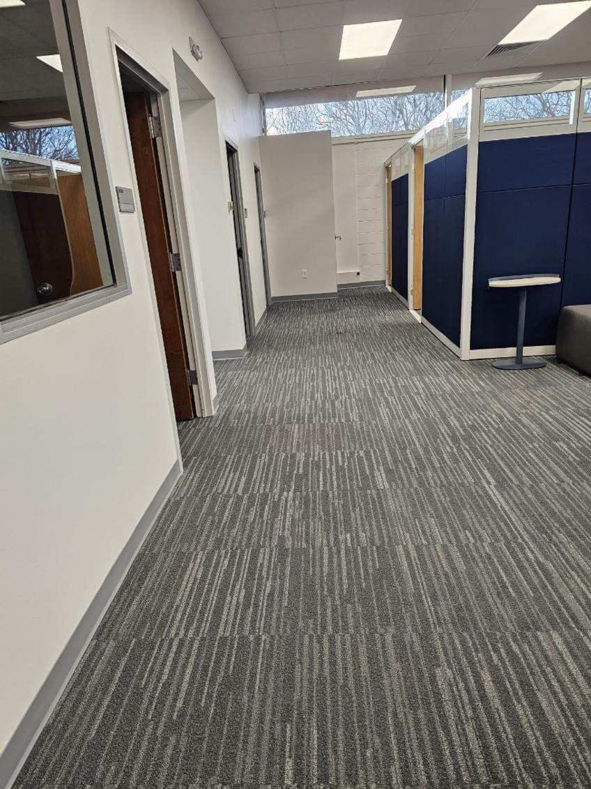 The finished internal corridor through the renovated office suite